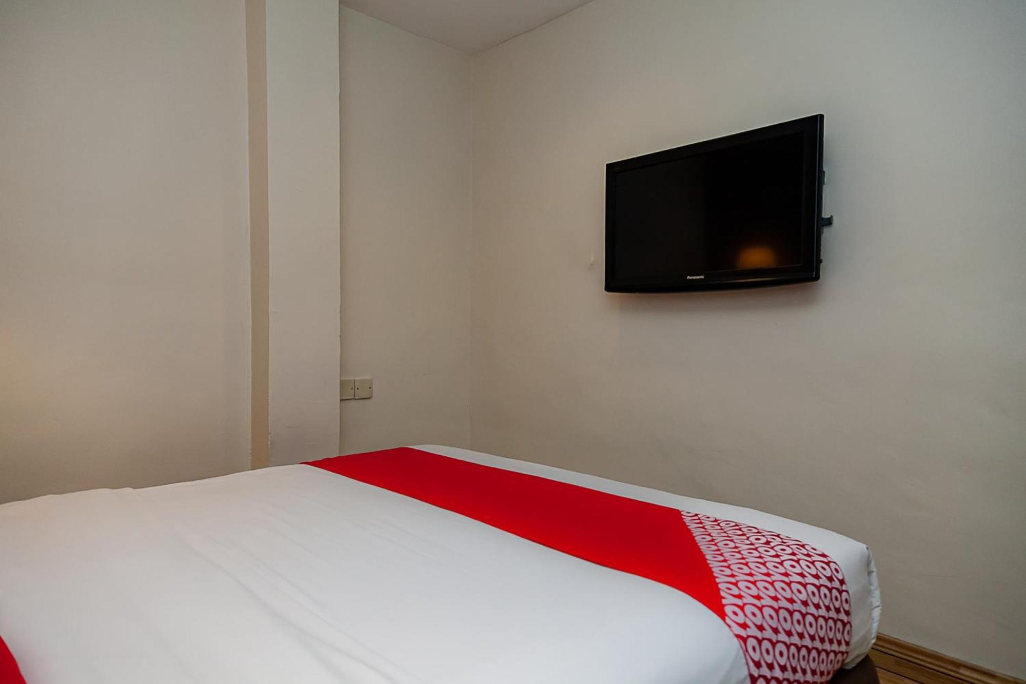 Super Oyo 90055 Mansion Inn Сибу Екстериор снимка